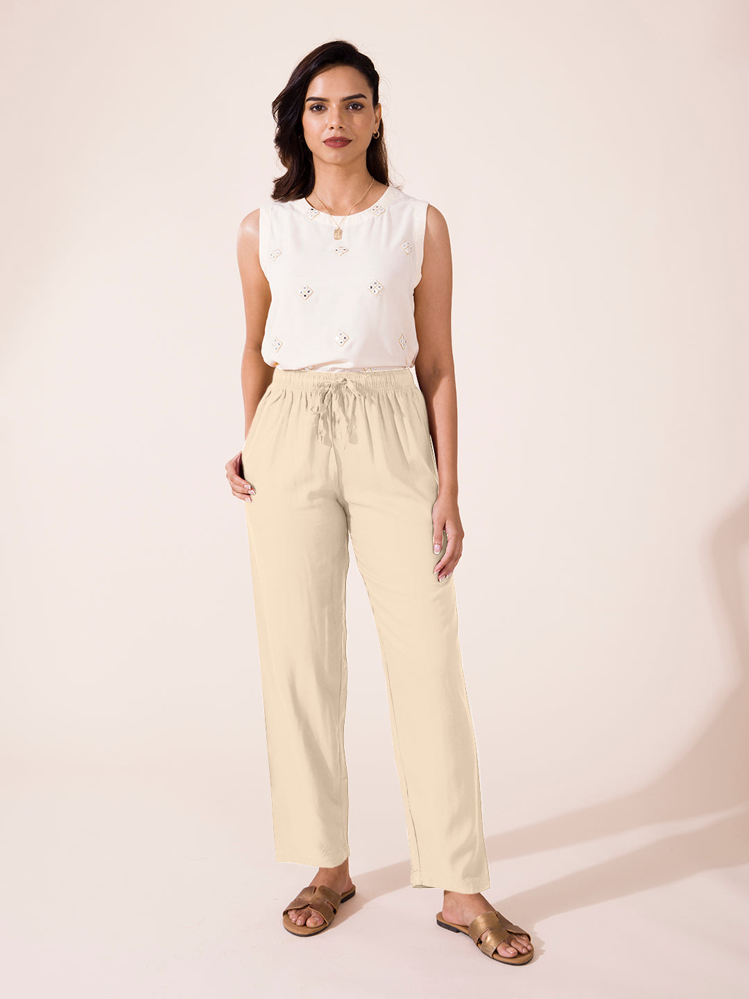 Women Solid Light Beige Mid Rise Casual Pants