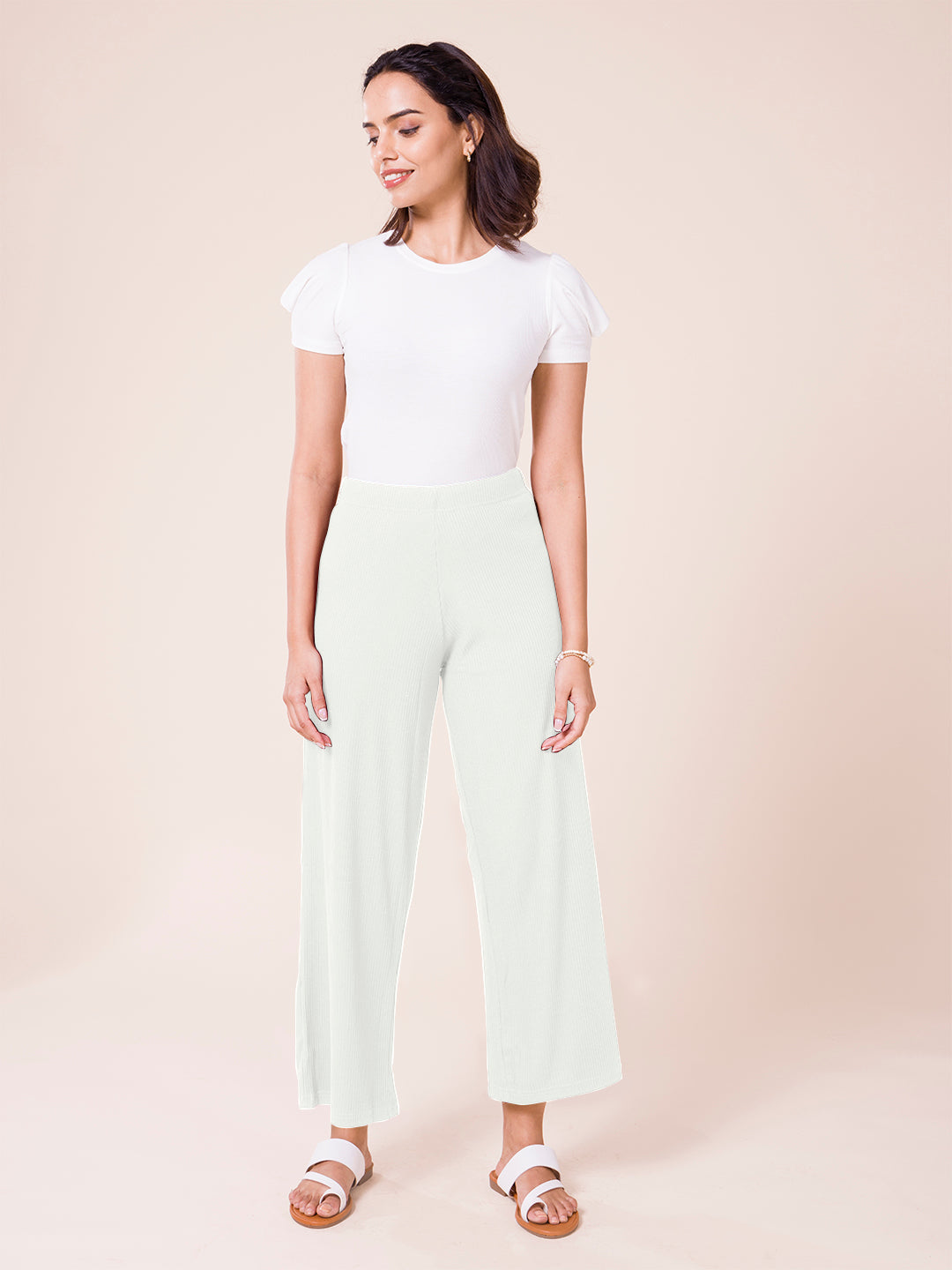Women Solid Cream Mid Rise Ribbed Palazzos
