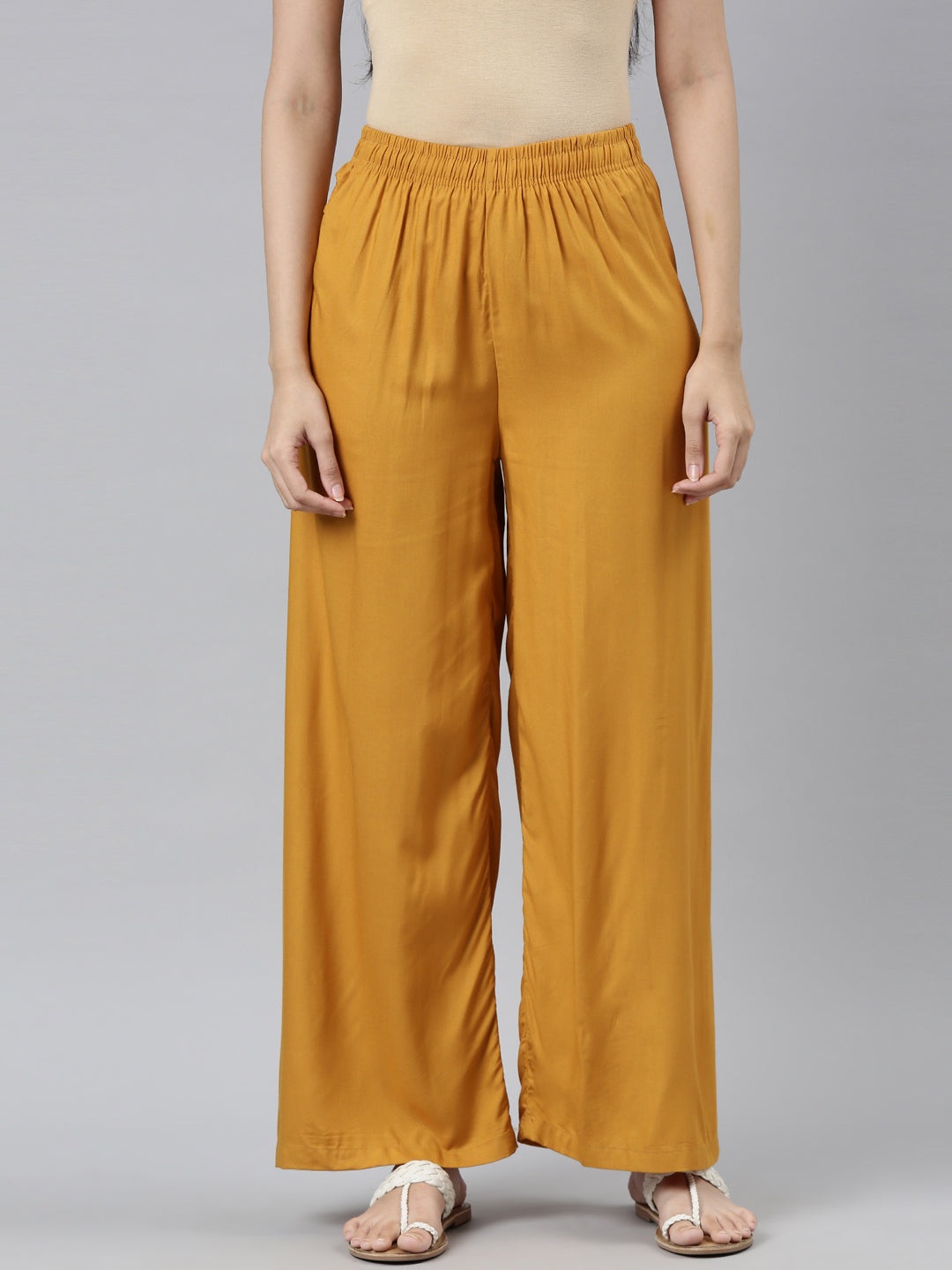 Buy online Mustard Rayon Flared Palazzo from Skirts tapered pants   Palazzos for Women by Clora Creation Plus for 999 at 60 off  2023  Limeroadcom