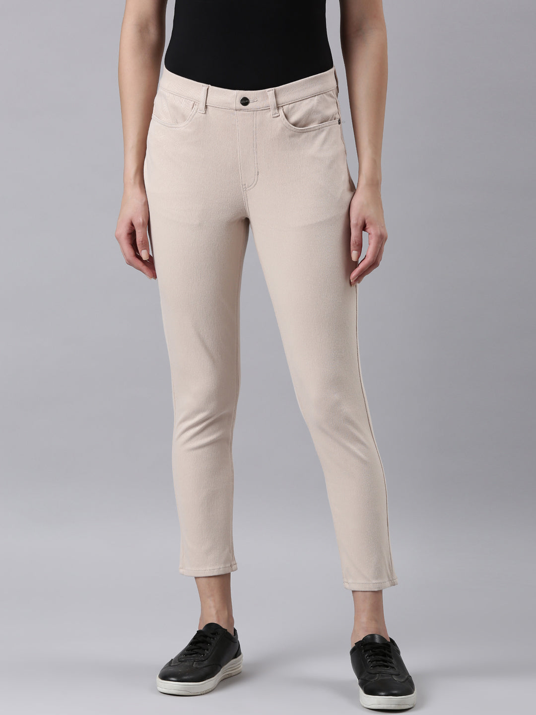 Women Solid Light Beige Mid Rise Cropped Jeggings