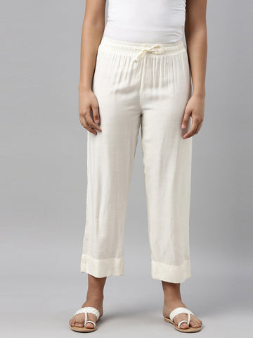 Women Solid Cream Straight Fit Silk Pant