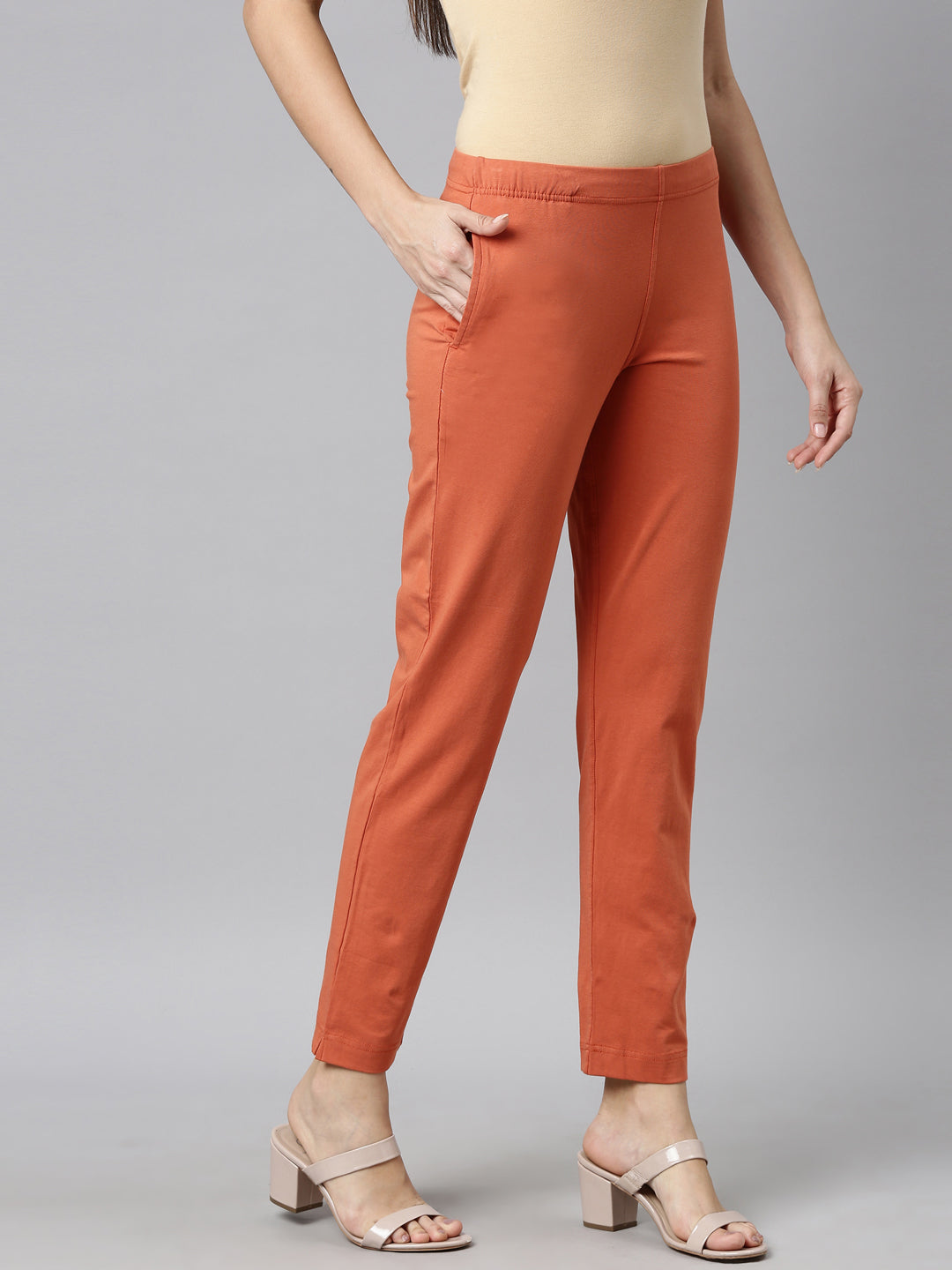 Women Solid Light Orange Cotton Mid Rise Kurti Pants